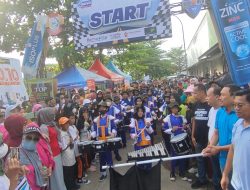 Camat Biringkanaya Dampingi Kadis Kominfo Makassar Lepas Jalan Sehat Longwis di Pasar Sentral BTP